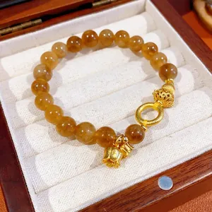 Bracciale di perle di citrino in stile cinese con ciondolo a loto dorato e charms vintage