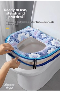 Detail of the zipper closure on thick plush toilet seat cover with floral pattern