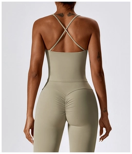 Back view of yoga bra with crisscross straps and high-waist ruched lifting leggings