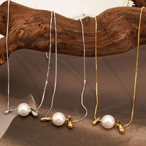 Long stainless steel snake chain necklace with pearl and geometric metal pendants