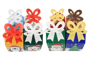 Detail of Christmas candy boxes with butterfly handles and festive cartoon characters