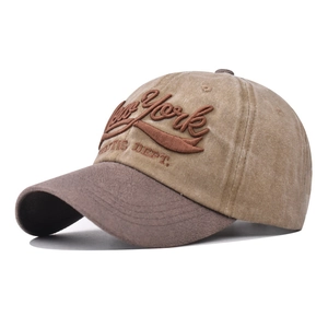 Detail of vintage washed cotton baseball cap with 3D New York embroidery and contrast brim