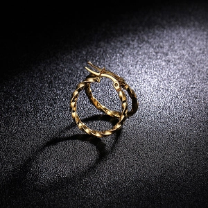 Polished gold twisted hoop earrings in stainless steel with a spiral textured finish
