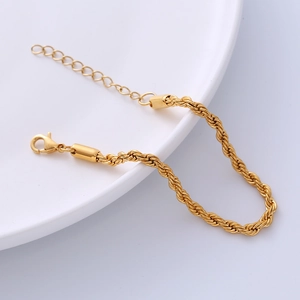 Bracciale a catena ritorta in titanio dorato da 4mm con chiusura a moschettone
