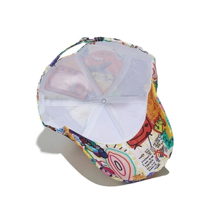 Detail view of the colorful graffiti baseball cap interior with purple adjustable strap