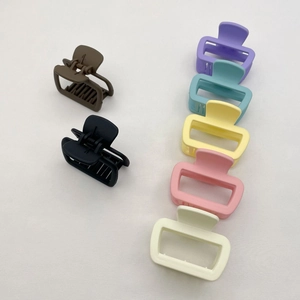 Minimalist square matte hair claws in multiple colors including brown, black and blue
