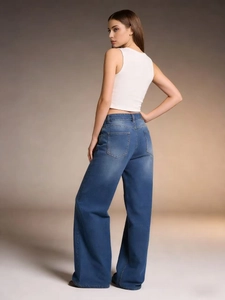 Detailed back view of high waisted wide leg denim jeans in deep blue wash for women