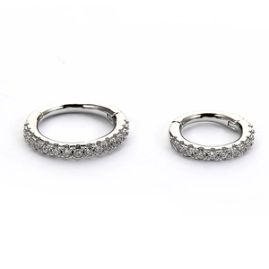 Detail view of S925 sterling silver hinged nose rings with sparkling zircon inlay