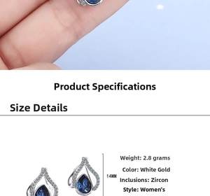 Detailed view of 14mm water drop earrings with deep blue cubic zirconia and silver finish