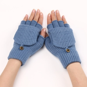 Blue knitted convertible fingerless gloves with a button flip-top shown on hands