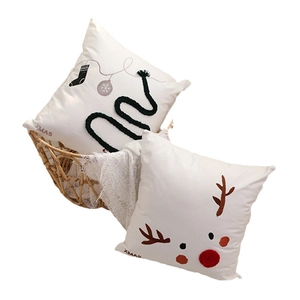 Christmas Santa throw pillows set of two featuring Xmas embroidery and deer pattern
