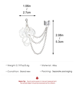 Detail of silver pterodactyl ear cuff with triple chains and alloy dragon stud earring