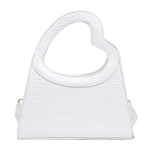 Chic white crocodile pattern shoulder bag with a unique heart-shaped integrated handle
