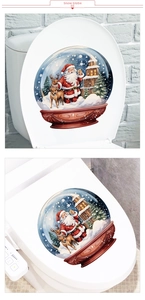 Detail of Christmas crystal ball decal showing Santa and reindeer on a toilet lid cover