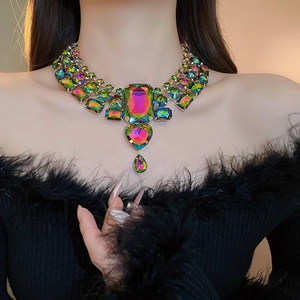 Close-up of luxury multi-layer necklace with colorful crystal square and heart pendants