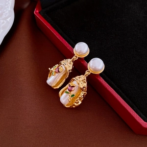 French vintage tulip earrings with pearls and gold plating in a luxury red velvet box