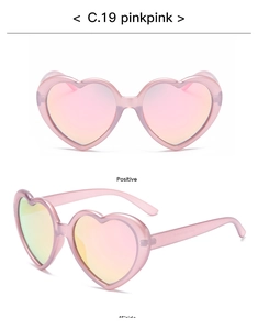 Detailed front and side views of heart-shaped pink sunglasses with reflective lenses