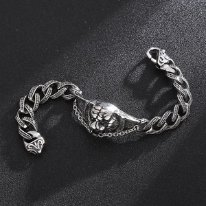Vintage stainless steel tiger head bracelet with thick engraved Cuban links and lobster clasp