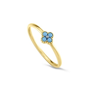 Detailed view of a gold clover ring set with blue turquoise stones and silver beads