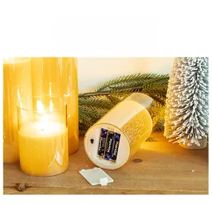 Detail of LED candle base with battery compartment and power switch for 3 AAA batteries