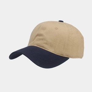 Detail of khaki and navy contrast baseball cap showing cotton twill texture and stitching