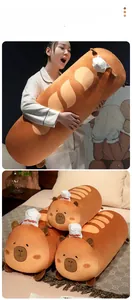 Macro detail of plush capybara bread pillow featuring brown stripes and a white chef hat