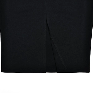 Detail of the high-waist back slit design on a black long-sleeve bodycon dress