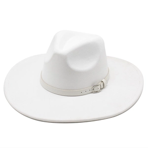 Detailed view of white wide-brim fedora hat with elegant leather buckle band decoration