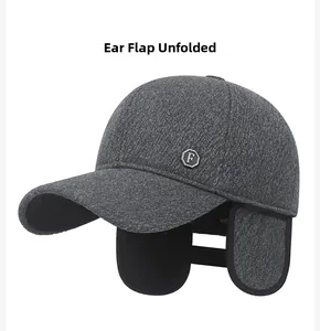 Detail view of winter baseball cap with unfolded ear flaps and gray wool texture