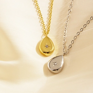 French vintage eight-pointed star pendant necklace in gold and silver stainless steel