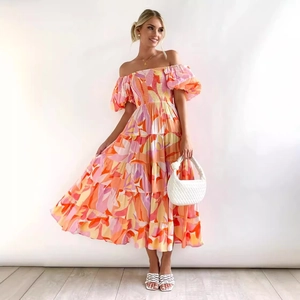 Summer puff sleeve off-shoulder floral maxi dress with vibrant abstract print and ruffled hem