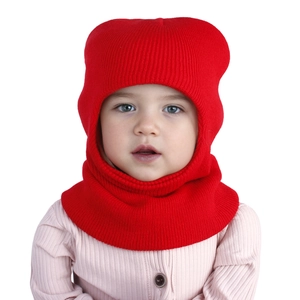 Detailed knit texture of children's red balaclava hood with warm neck gaiter design