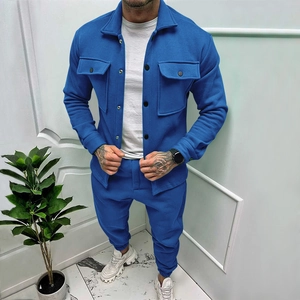 Detailed view of casual men's blue suede style jacket and matching jogger pants set