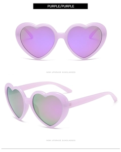 Detail view of purple heart-shaped polarized sunglasses with gradient mirror lenses