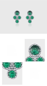 Makroaufnahme von 925er Sterlingsilber-Ohrringen mit grünen 5A-Zirkonia Steinen