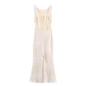 Elegant backless sequin dress in champagne with cross strap detail and wavy patterns