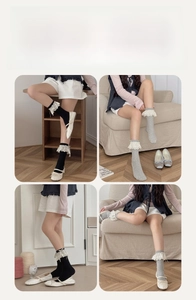 Detail of sweet lace-trimmed socks in black and gray with bow ballet aesthetic