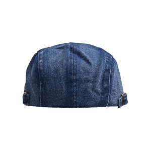Rear view of vintage blue washed denim ivy cap featuring adjustable metal side buckles