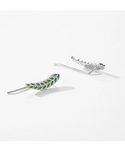 Close-up of S925 sterling silver leaf earrings with green enamel and 925 stamp