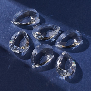Detailed view of clear teardrop crystal suncatchers with elegant hollow-out design