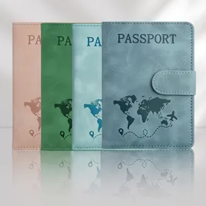 Detailed view of PU leather passport covers in four colors with world map embossing