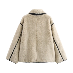 Beige faux fur jacket for women with black contrast trim and loose fit design