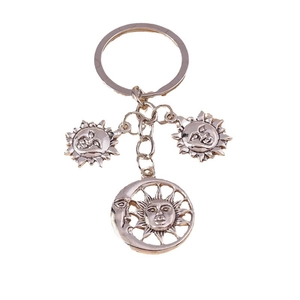 Creative sun and moon keychain featuring vintage bronze metal pendants and face design