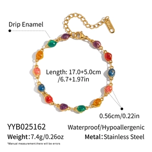 Macro view of colorful enamel shell links on stainless steel bracelet with dimensions