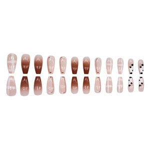 Long ballet press-on nails with cow print gradient and brown autumn aesthetics