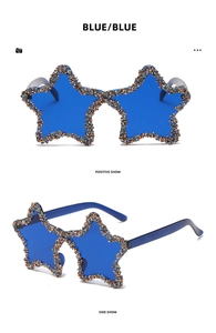 Close-up of blue star-shaped sunglasses with hand-set rhinestones on the frame edges