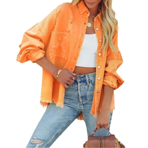 Bright orange distressed denim jacket with fringe edges and lapel collar for women