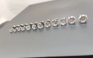 Set of 6 pairs varying size cubic zirconia stud earrings in polished 316L stainless steel