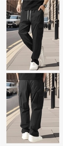 Front and back street view of black straight-leg cargo pants with white drawstring details