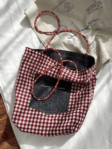 Retro red and white checkered canvas tote bag with denim pocket and braided handle